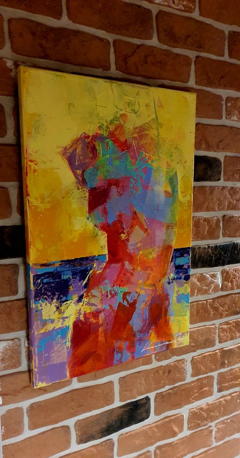 Akt painting by Karwowskion brick slips feature wall