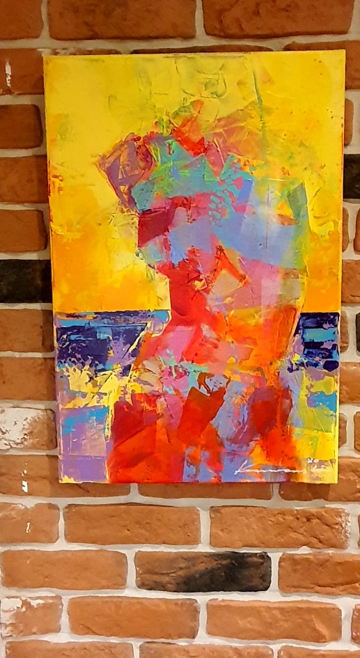 Akt painting display on brick slips wall